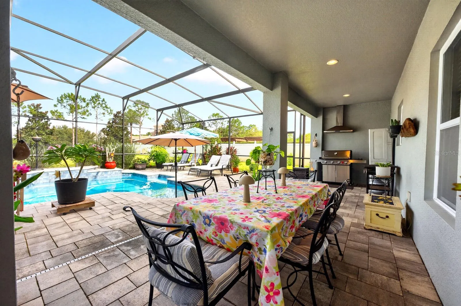 The covered lanai has an area for a summer kitchen.
