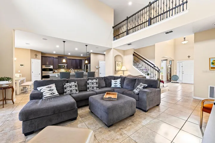 Natural light pours into the two story family room.