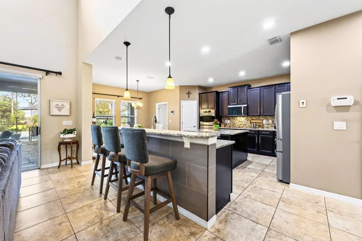The kitchen truly is the heart of this beautiful home, gather with family or entertain friends.