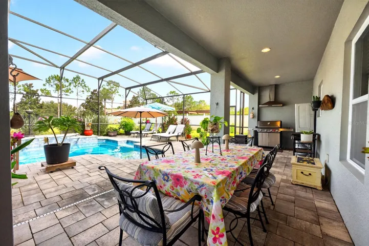 The covered lanai has an area for a summer kitchen.
