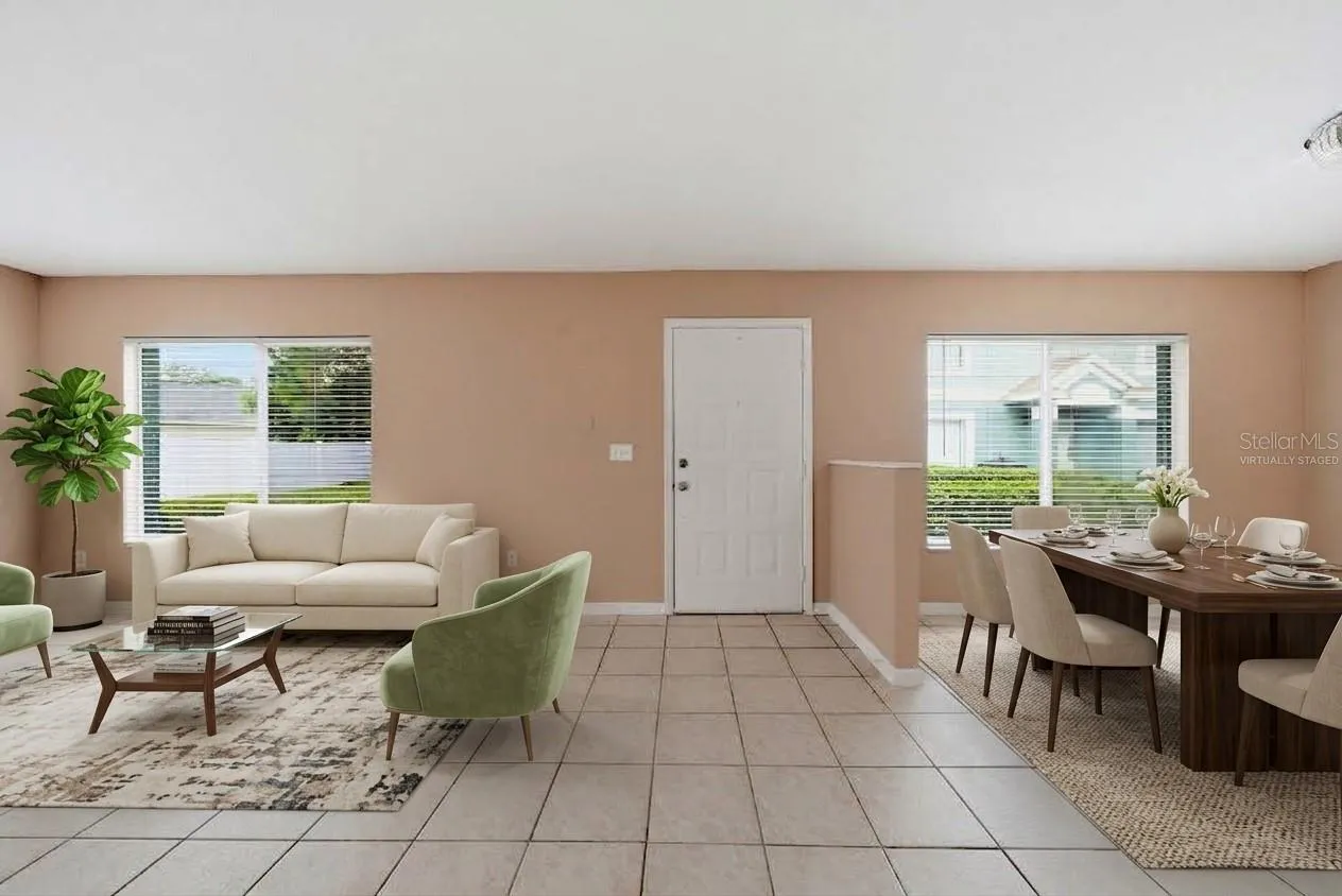 Open Layout family/dining area. Virtually staged