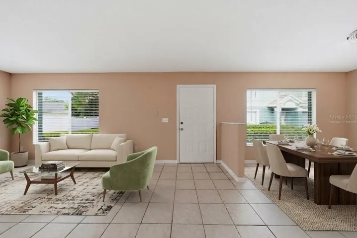 Open Layout family/dining area. Virtually staged