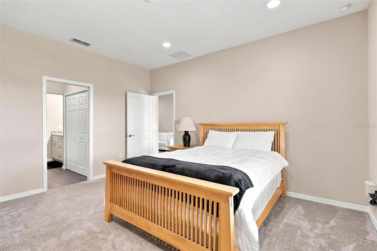 Primary Bedroom located at back of home and features extra plush carpeting.