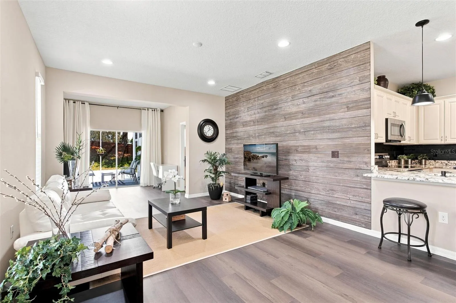 Open Living Spaces and Split Floor Plan. Living Room overlooks dining and kitchen and features luxury vinyl flooring.