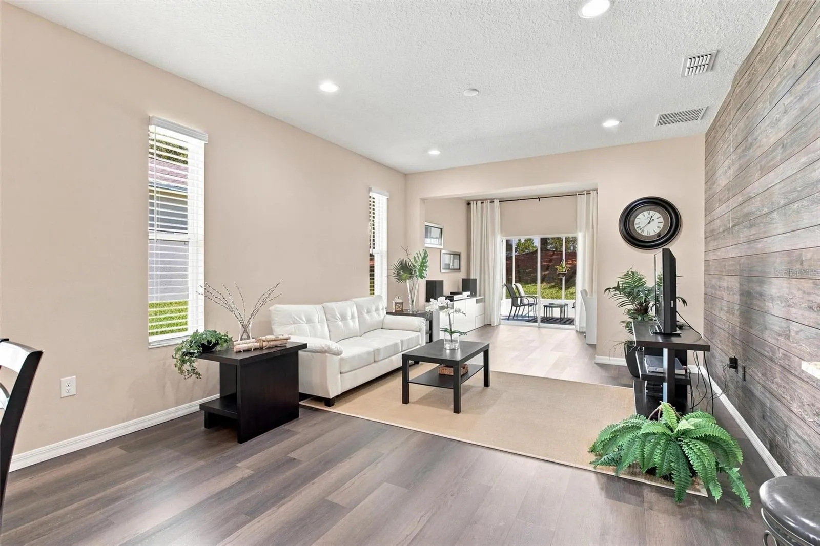 Open Living Spaces and Split Floor Plan. Living Room overlooks dining and kitchen and features luxury vinyl flooring.