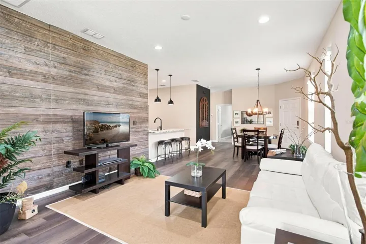 Open Living Spaces and Split Floor Plan. Living Room overlooks dining and kitchen and features luxury vinyl flooring.
