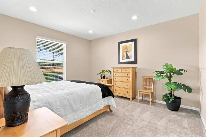 Primary Bedroom located at back of home and features extra plush carpeting.