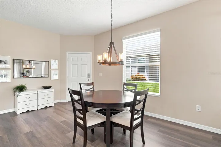 Open Living Spaces and Split Floor Plan. Living Room overlooks dining and kitchen and features luxury vinyl flooring.