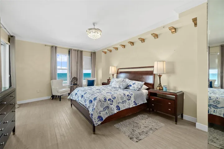 Primary bedroom with balcony access