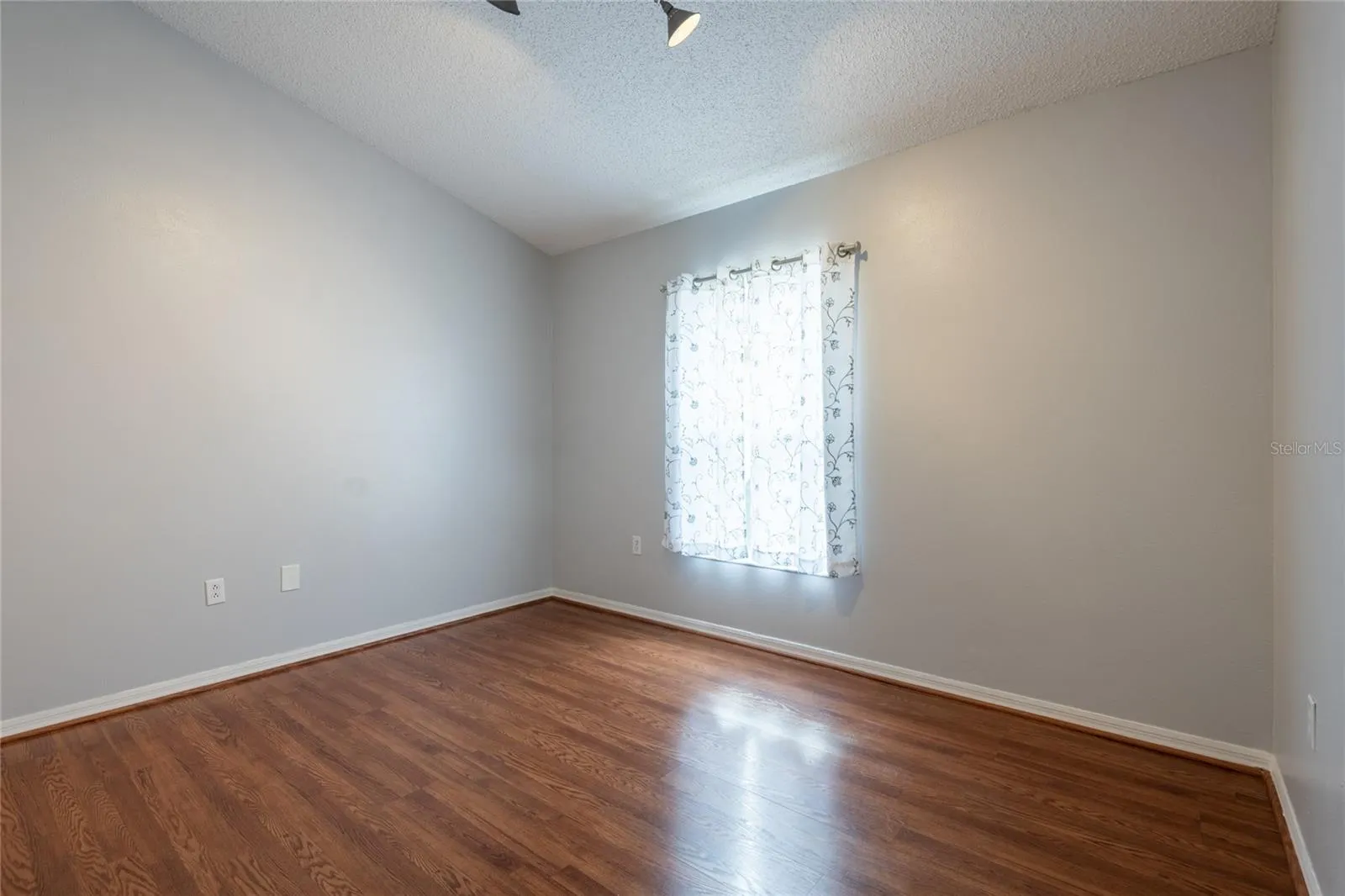 3rd bedroom with vaulted ceiling