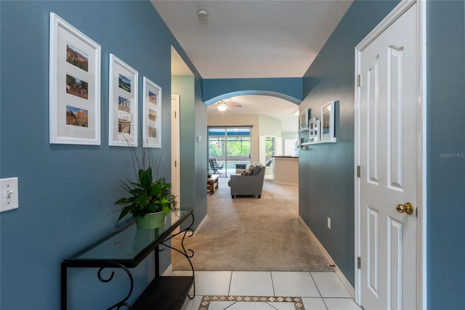 Spacious foyer with coat closet.