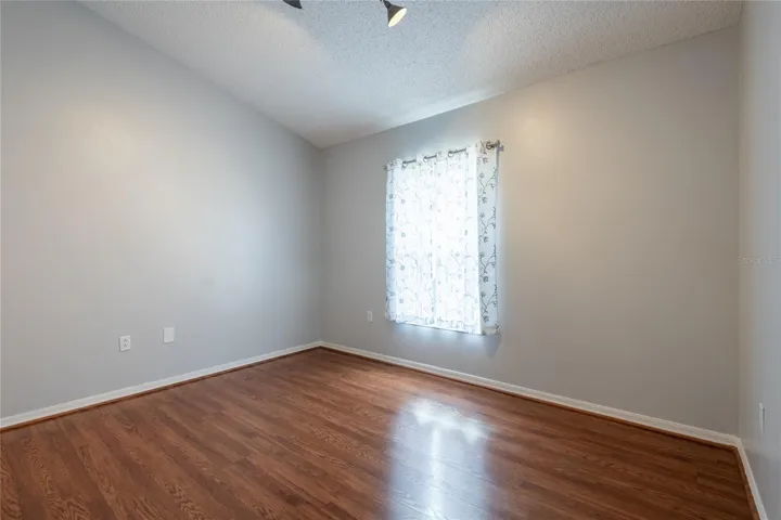 3rd bedroom with vaulted ceiling