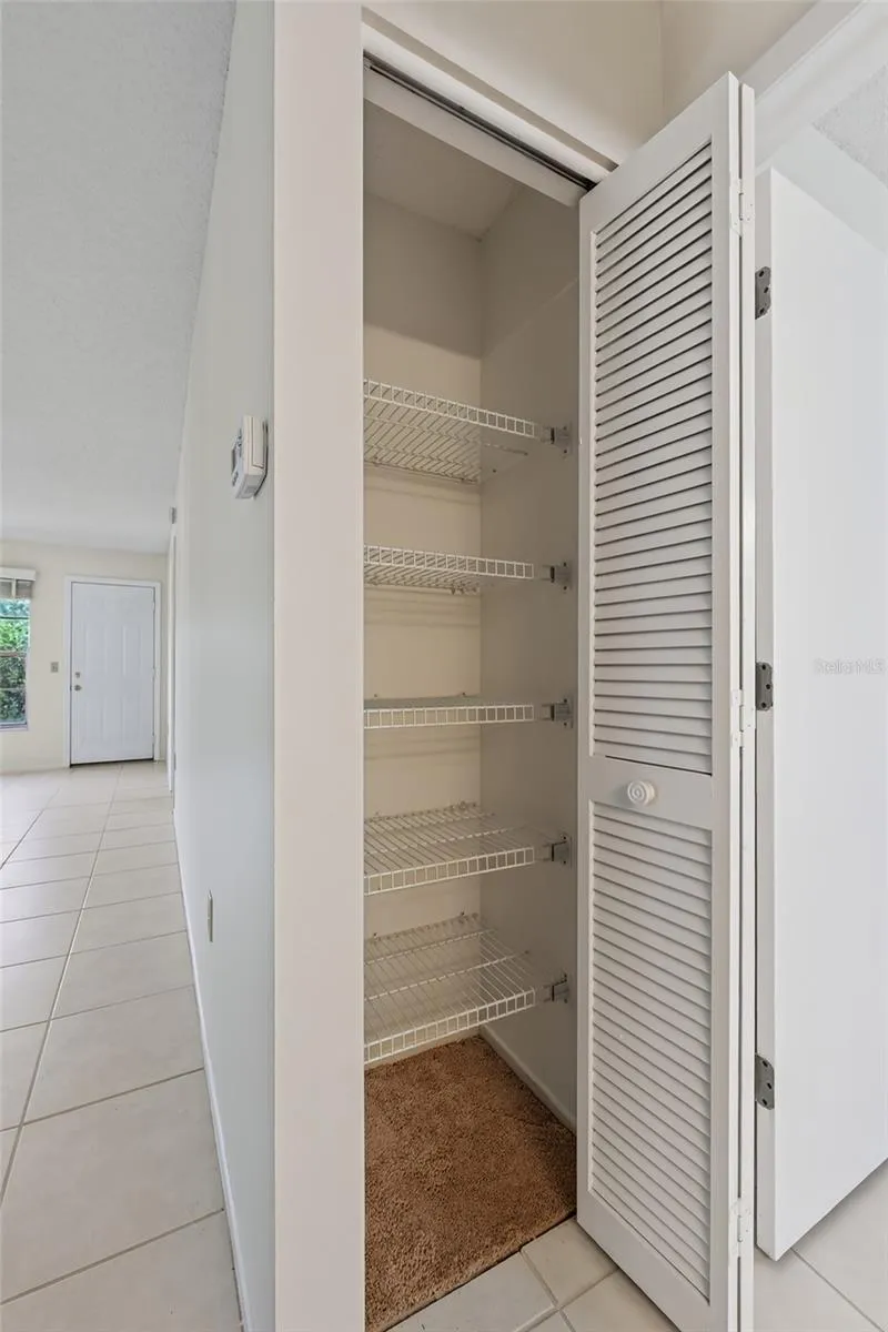Linen Closet by Front Bedroom- 9545 Danville Court, #42, New Port Richey, FL 34655Wedgewood Village Condos in Heritage Lake