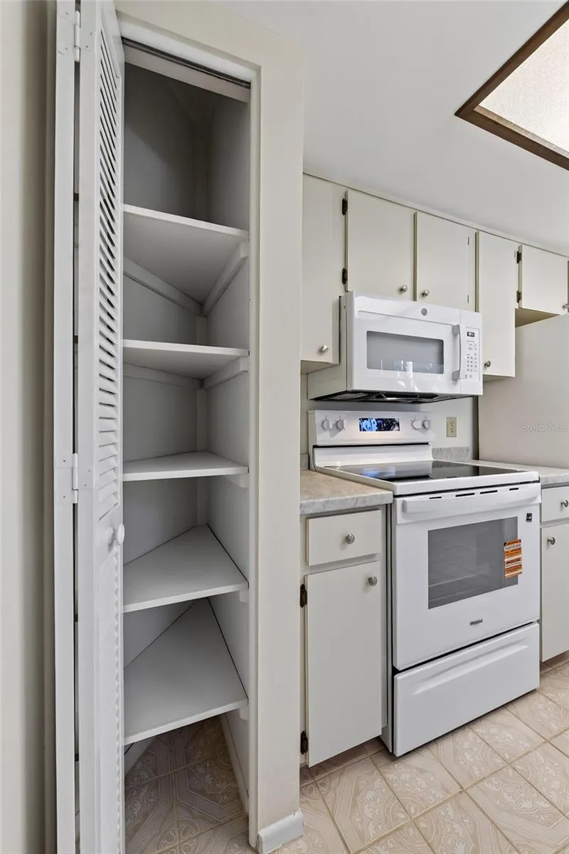 Pantry in Kitchen Area- 9545 Danville Court, #42, New Port Richey, FL 34655Wedgewood Village Condos in Heritage Lake