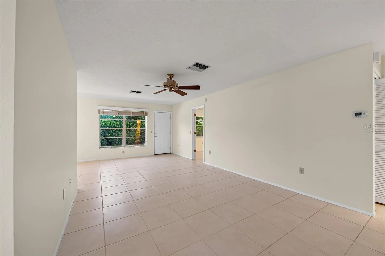 Virtually Staged Living Room- 9545 Danville Court, #42, New Port Richey, FL 34655Wedgewood Village Condos in Heritage Lake