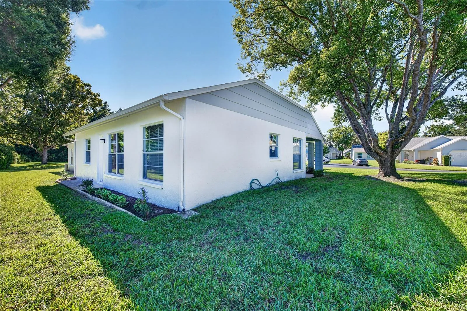 Rear Side View- 9545 Danville Court, #42, New Port Richey, FL 34655Wedgewood Village Condos in Heritage Lake