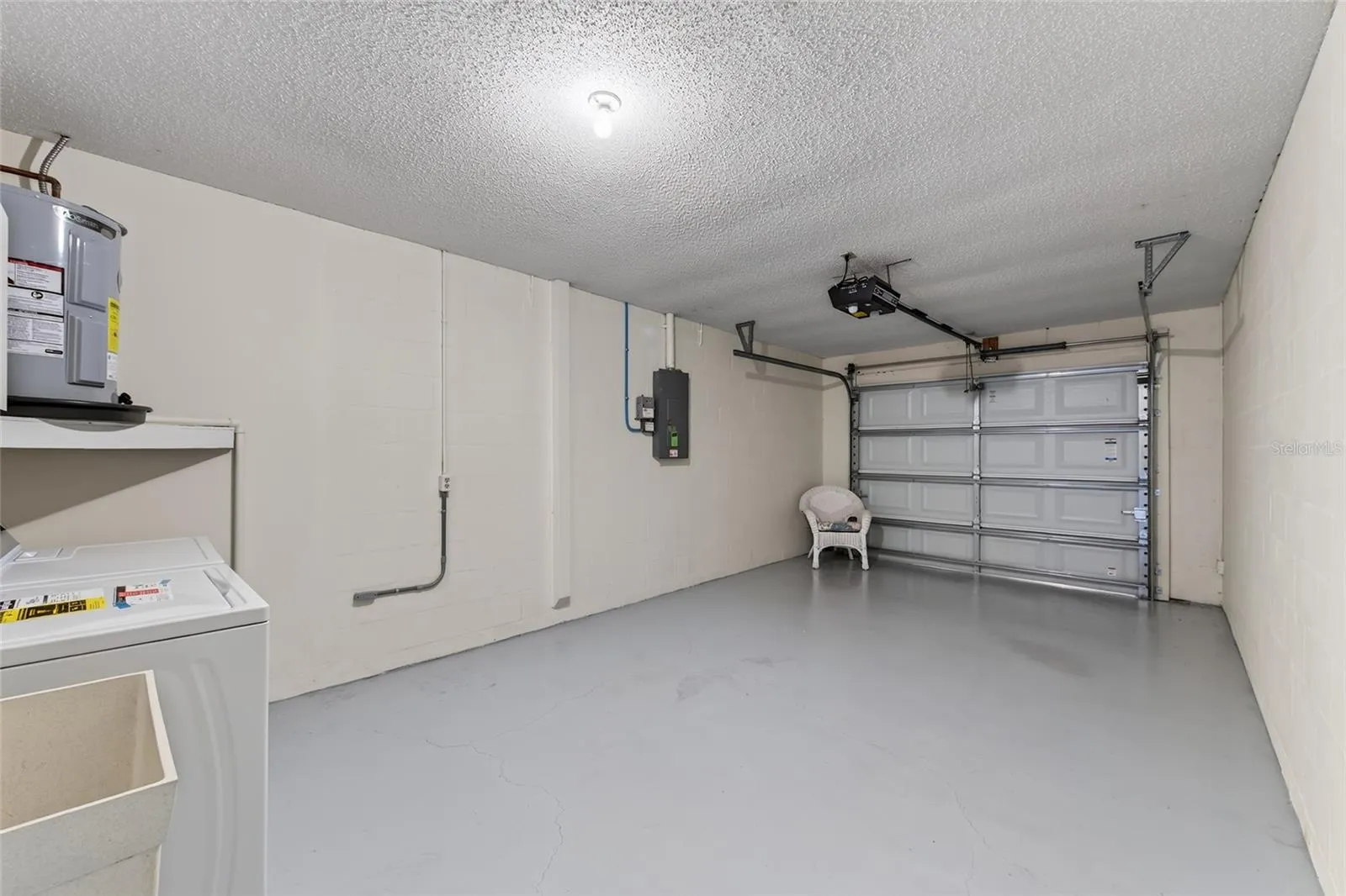 Oversized Garage & Laundry Area- 9545 Danville Court, #42, New Port Richey, FL 34655Wedgewood Village Condos in Heritage Lake