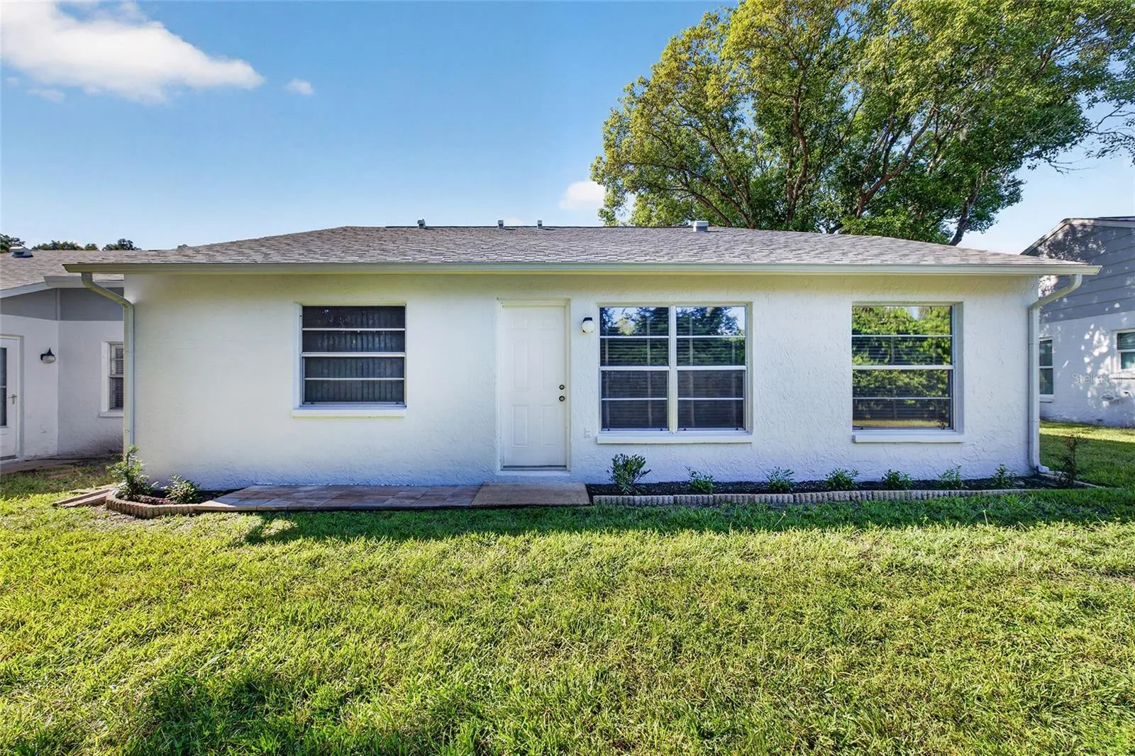 Rear View- 9545 Danville Court, #42, New Port Richey, FL 34655Wedgewood Village Condos in Heritage Lake