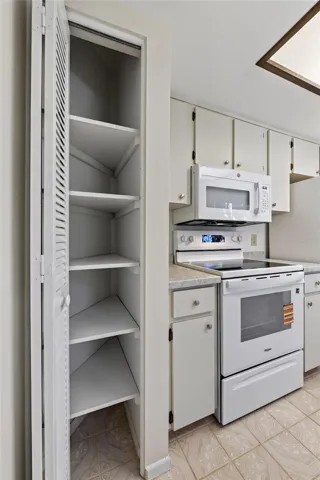 Pantry in Kitchen Area- 9545 Danville Court, #42, New Port Richey, FL 34655Wedgewood Village Condos in Heritage Lake