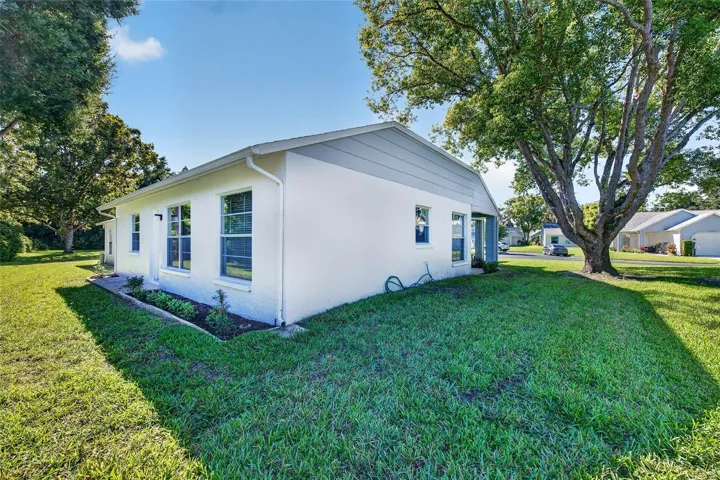 Rear Side View- 9545 Danville Court, #42, New Port Richey, FL 34655Wedgewood Village Condos in Heritage Lake