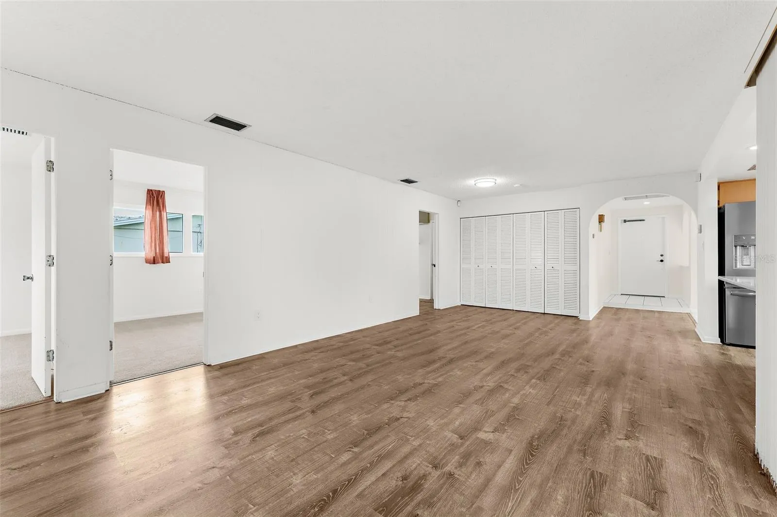 Family room view 5. Are you noticing the good sized and separate living areas?
