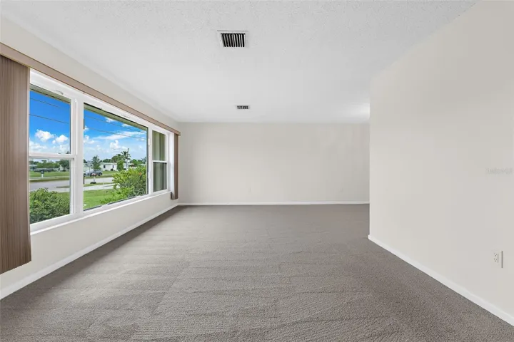 Living room view. IMPACT windows throughout