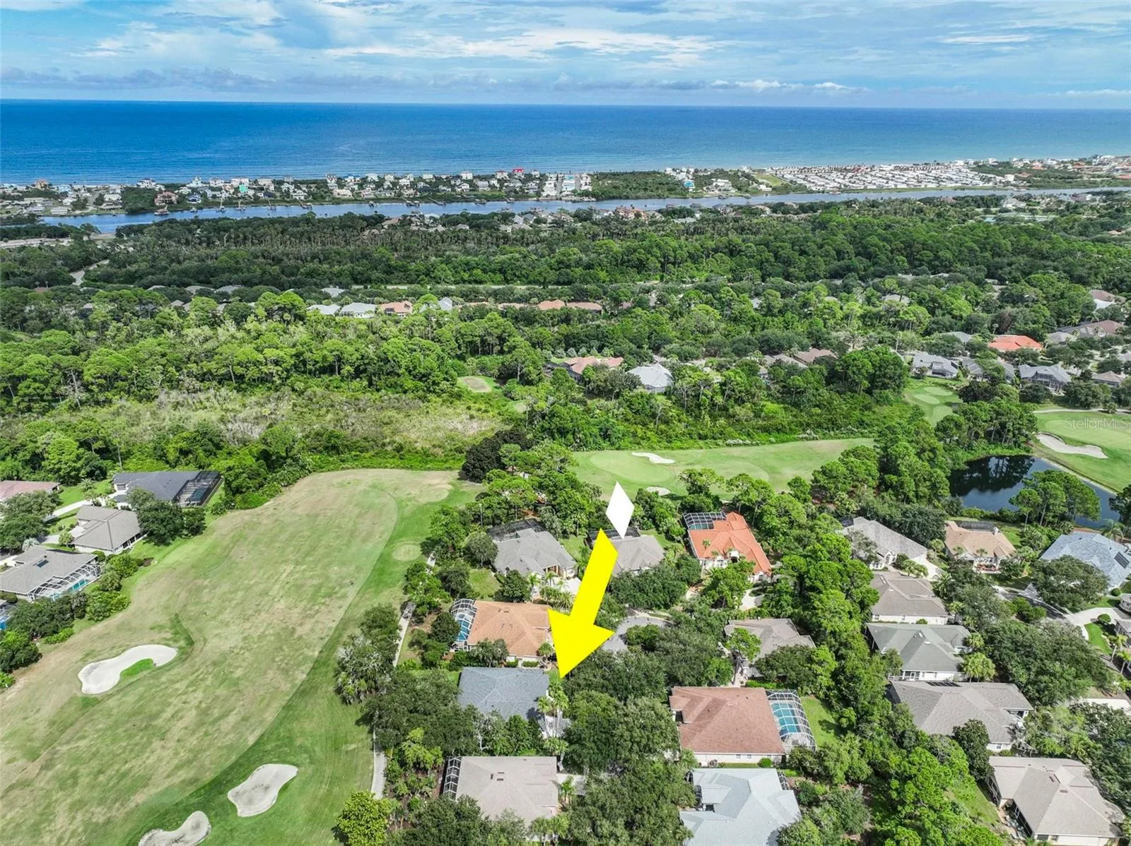 Aerial View of home on the Jack Nicklaus Golf Course and Ocean just minutes away