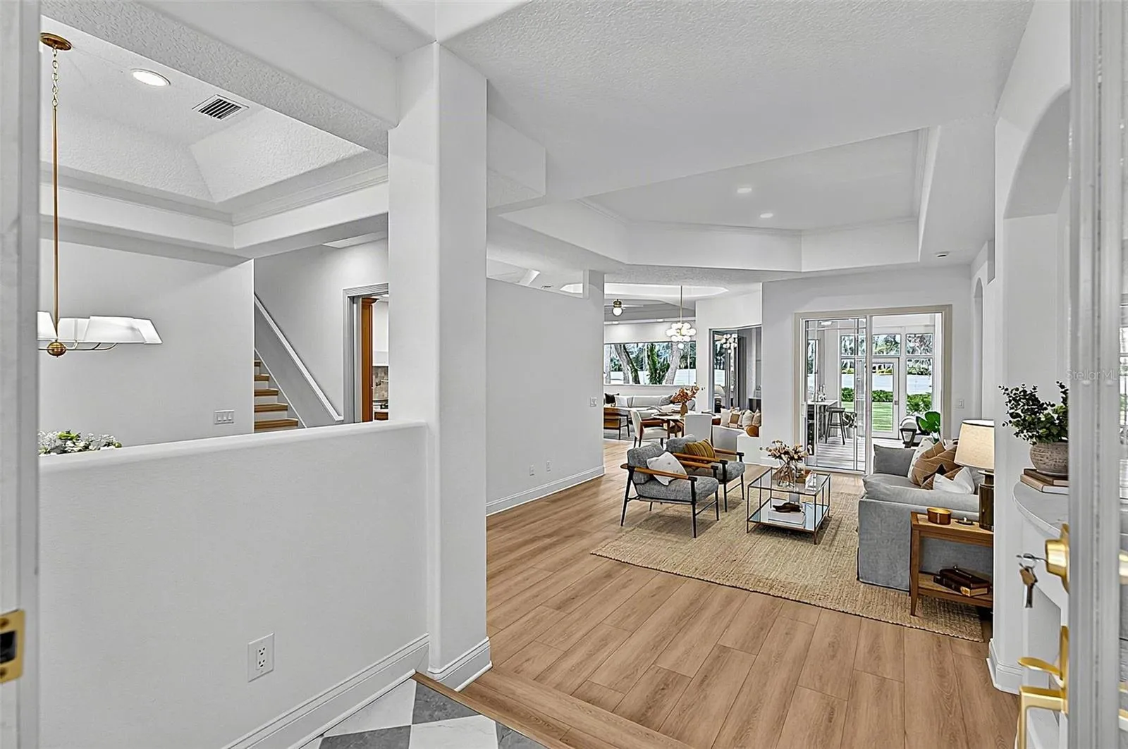Front Elegant Foyer to Formal Living Room