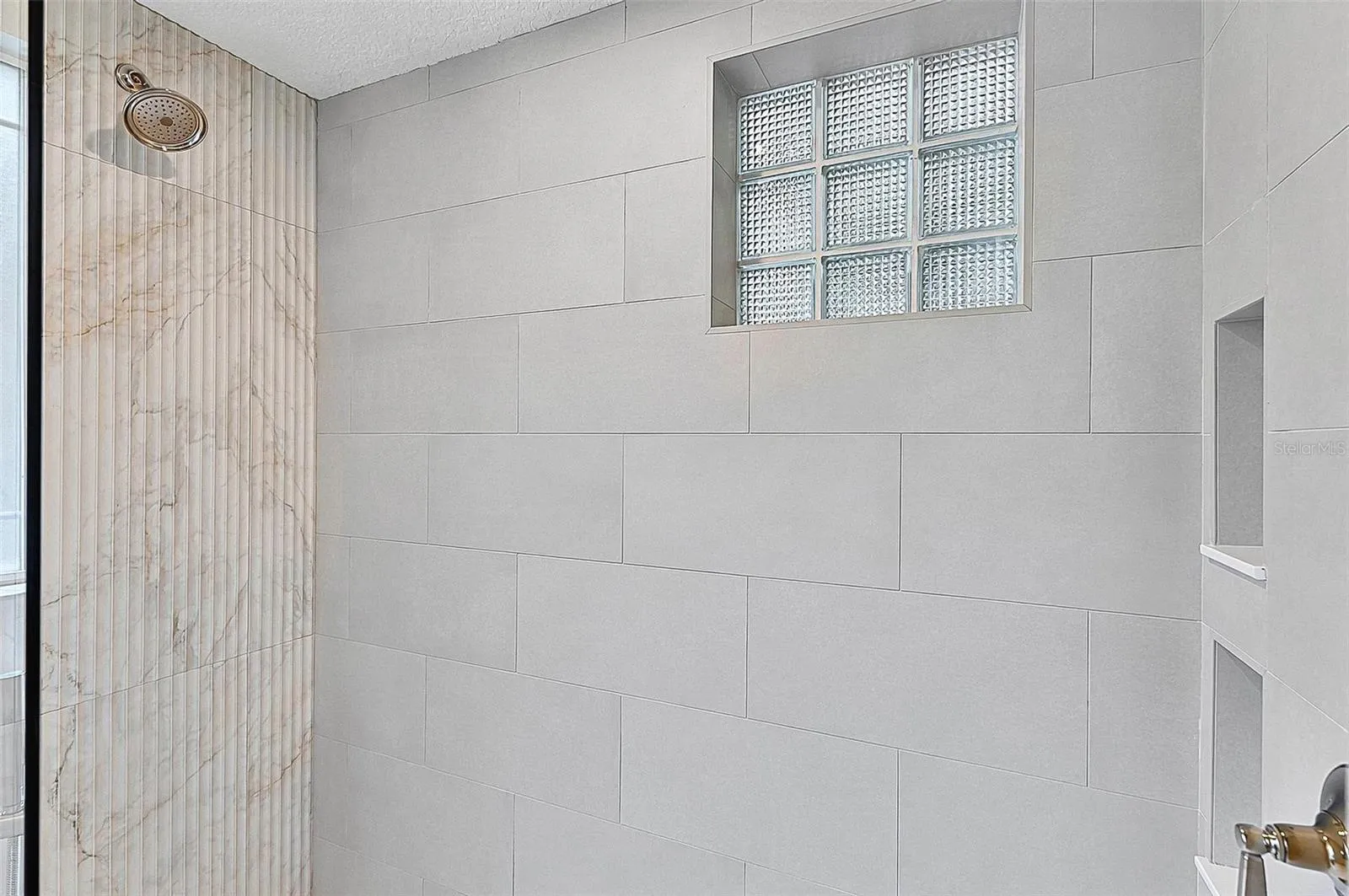 Tiled shower with inserts