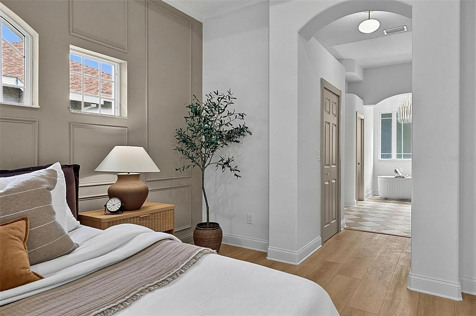 A piece of heaven in the Master Bedroom Retreat with transient window bringing in natural light. Sliders go out to the solarium and into stunning Master Bath Retreat