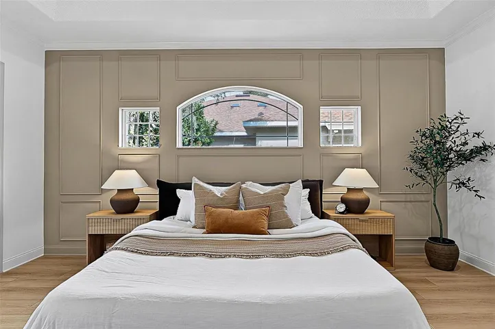 A piece of heaven in the Master Bedroom Retreat with transient window bringing in natural light. Sliders go out to the solarium