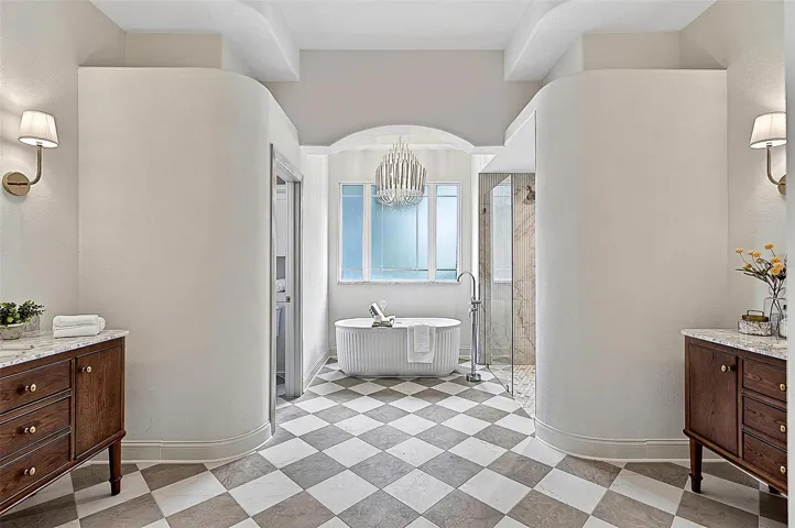 Looking like an upscale magazine, this formal Master Bath gives all the spa vibes