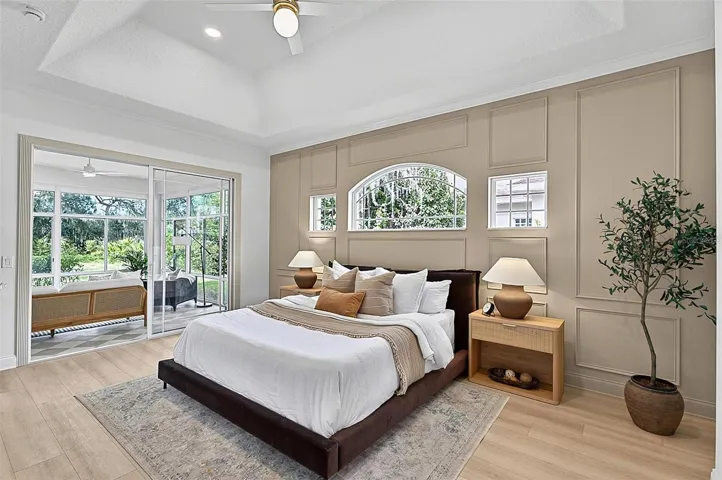 A piece of heaven in the Master Bedroom Retreat with transient window bringing in natural light. Sliders go out to the solarium