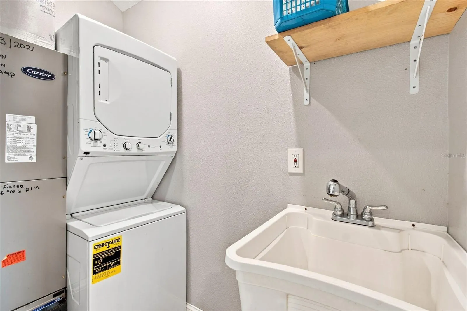 LAUNDRY ROOM WITH W/D AND SINK