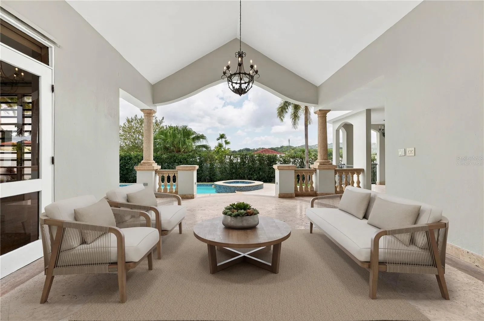 Covered Outdoor Space - This image has been virtually staged and does not reflect the current state of the property. Covered Outdoor Space - This image has been virtually staged and does not reflect the current state of the property.