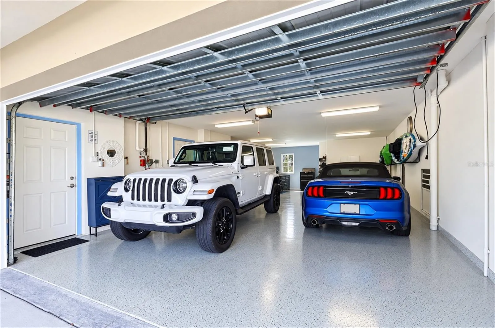 Oversized 4 car garage will accomodate boats, vehicles &amp; all your toys