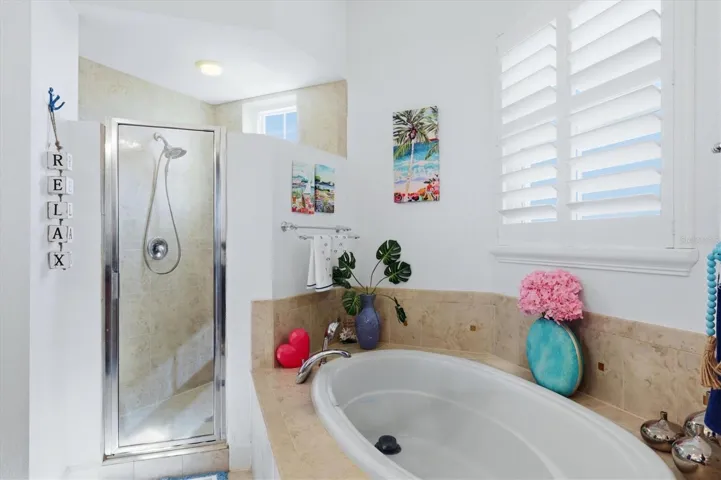 Primary Bath has a large soaking tub and separate shower