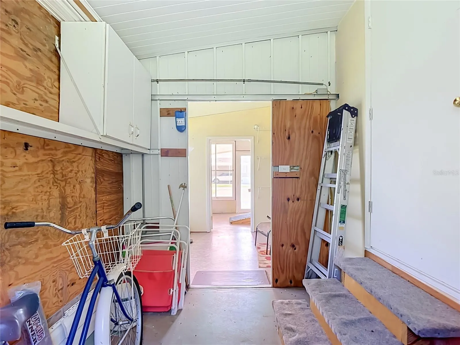 Door is access to Primary Room and Laundry.