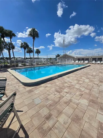 Beautiful pool with plenty of lounge chairs