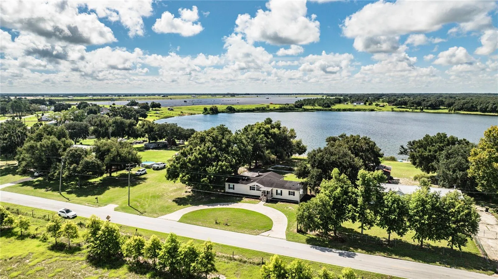 Front of house with view of Lake Walker