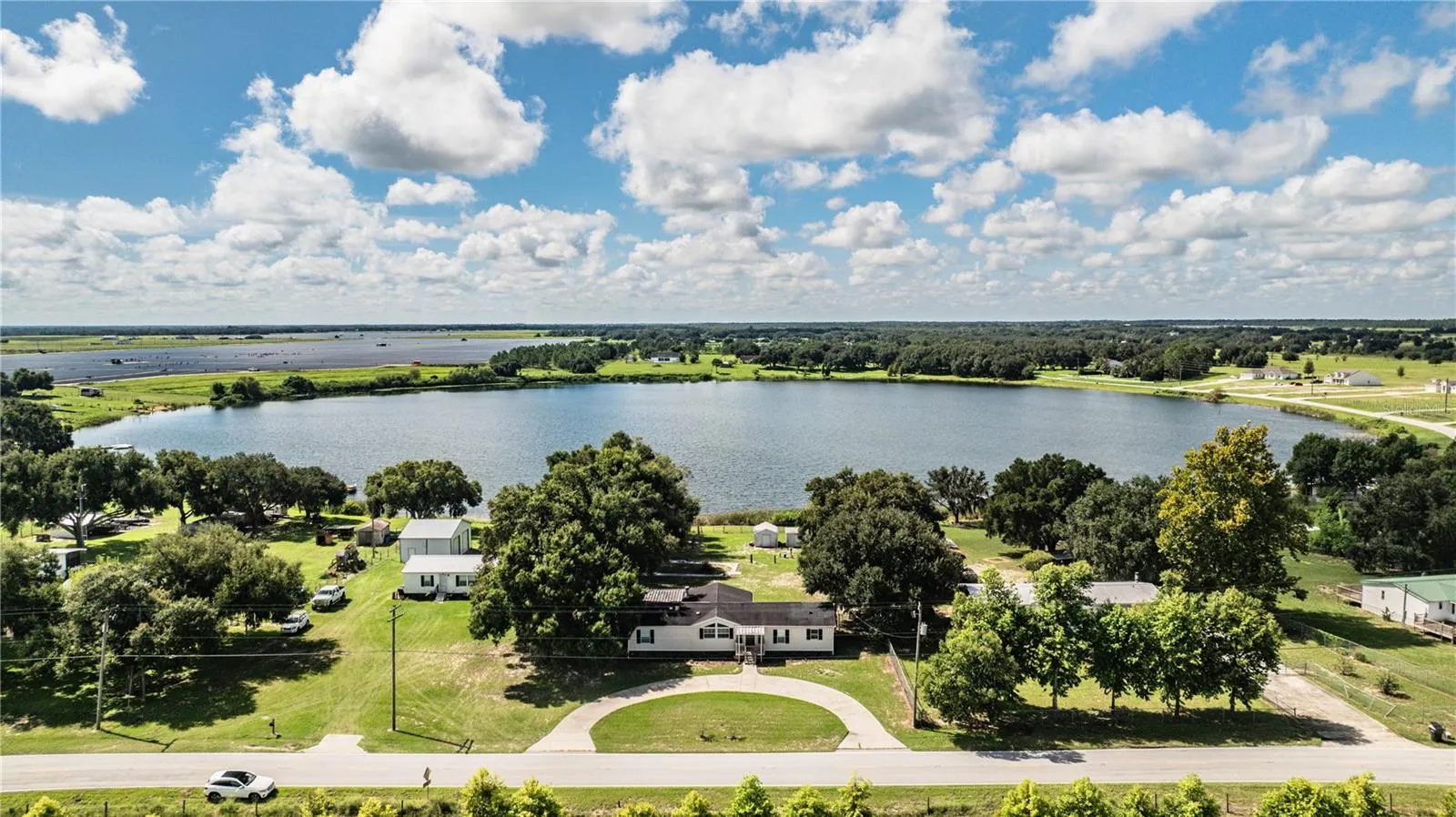 Front of house with view of Lake Walker