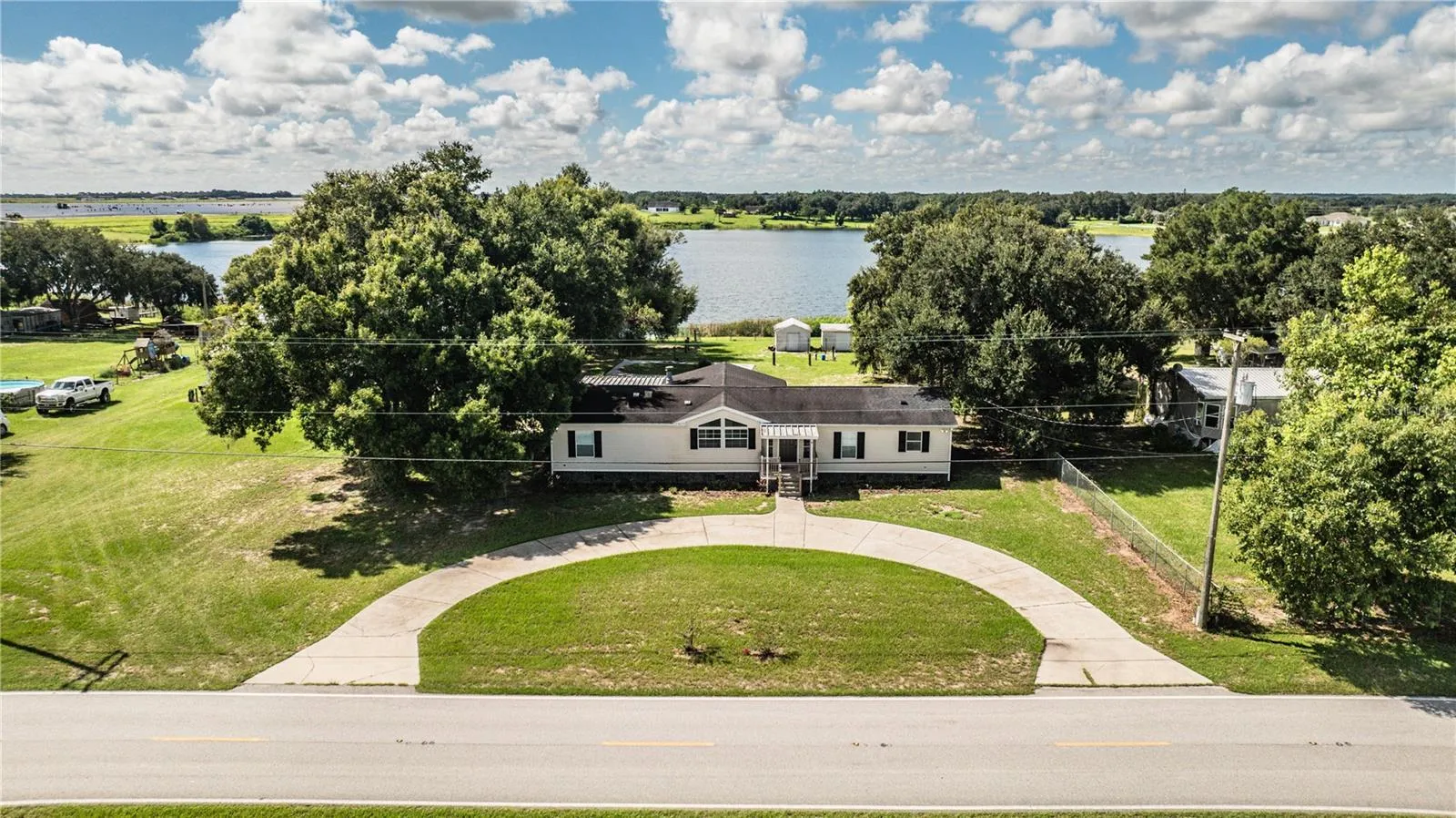 Front of house with view of Lake Walker