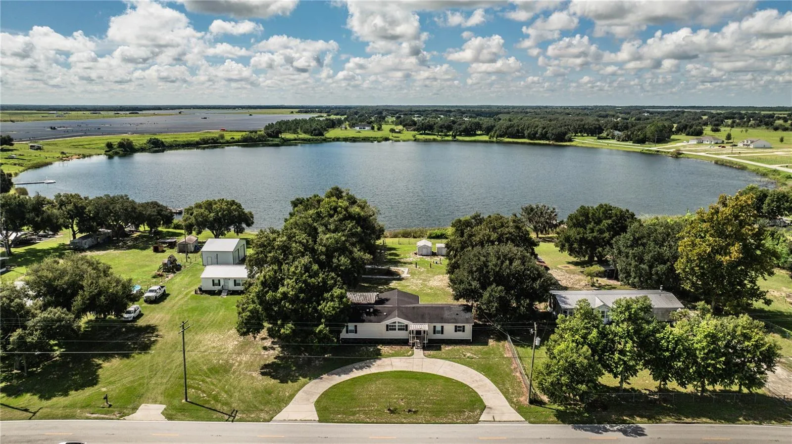 Front of house with view of Lake Walker