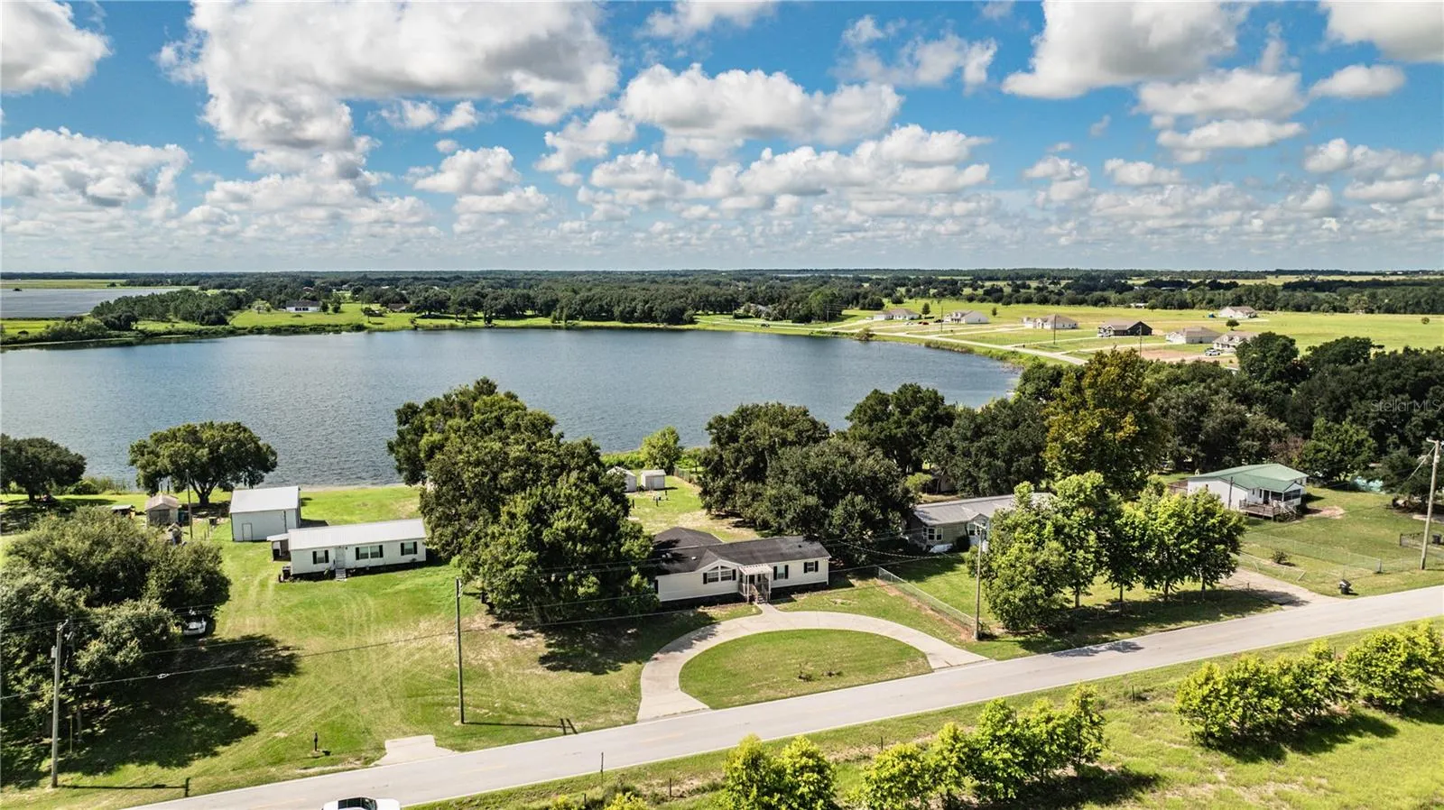 Front of house with view of Lake Walker