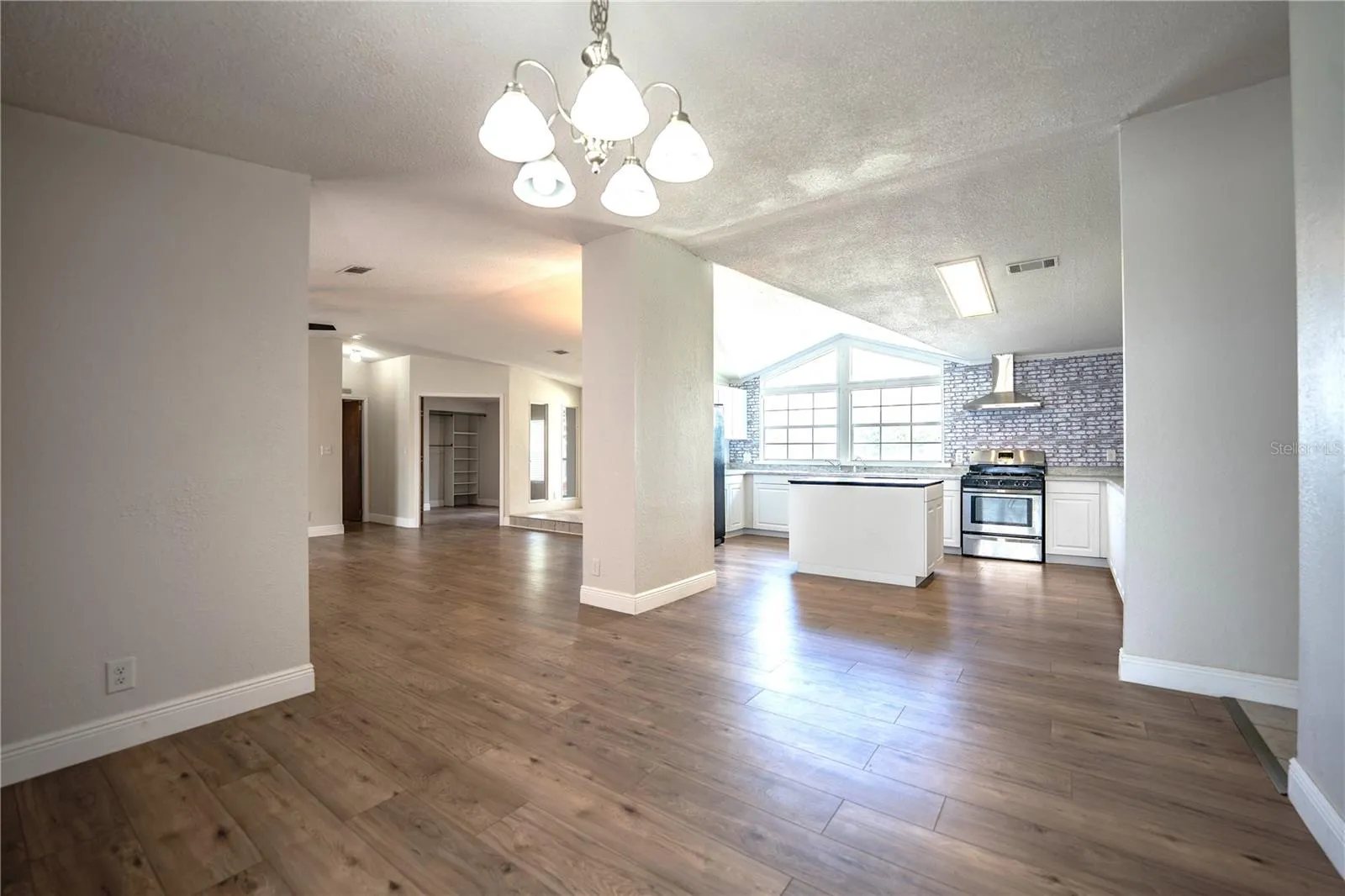 Dining Room looking into kitchen and living room