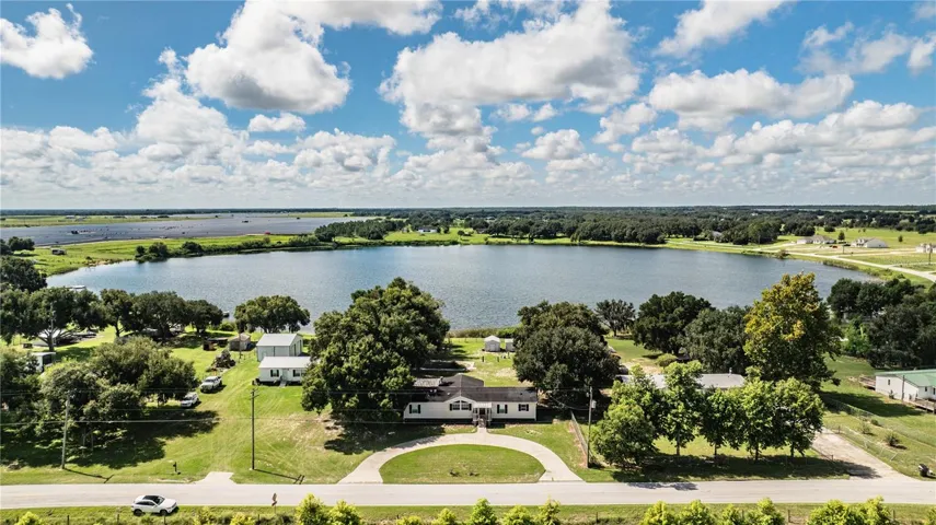 Front of house with view of Lake Walker