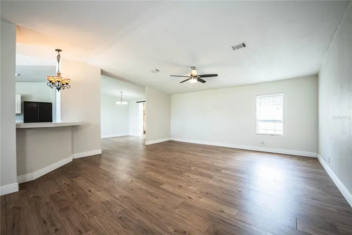 Living Room looking at kitchen and dining room