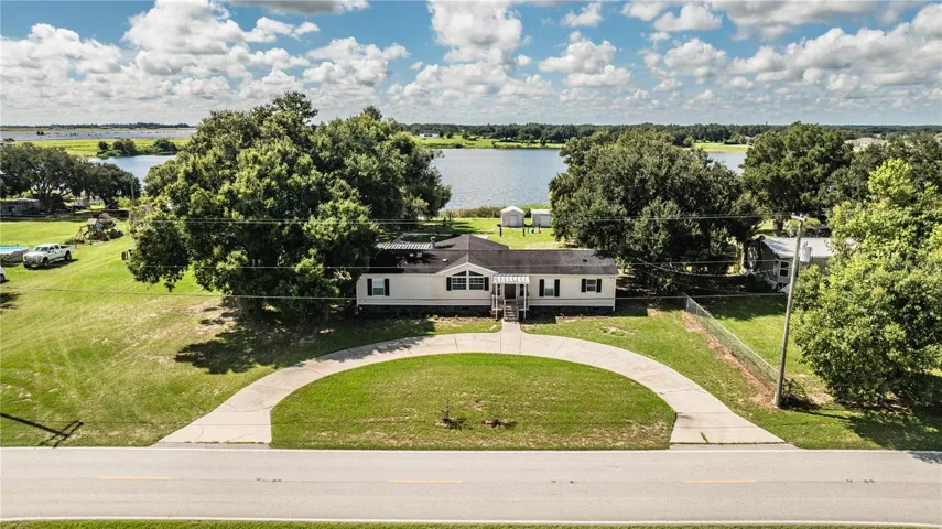 Front of house with view of Lake Walker