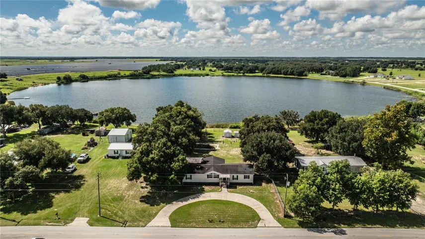 Front of house with view of Lake Walker