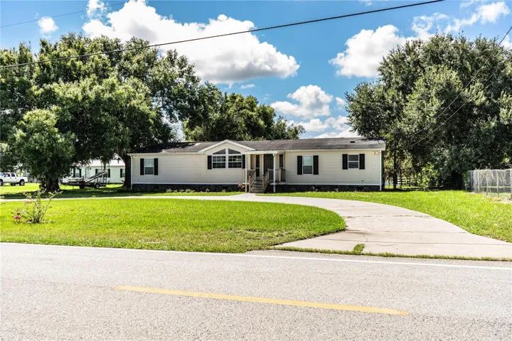 Front with circle driveway
